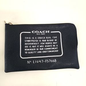 Coach Story patch wristlet